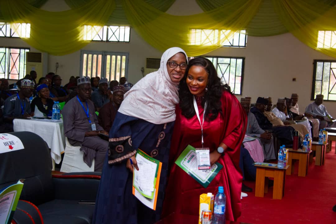 Dr. Comfort Adokwe-Obed, Founder and Executive Director, addressing a full hall of delegates.
